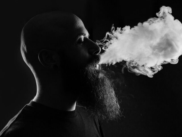 Large cloud of vapour against a black background