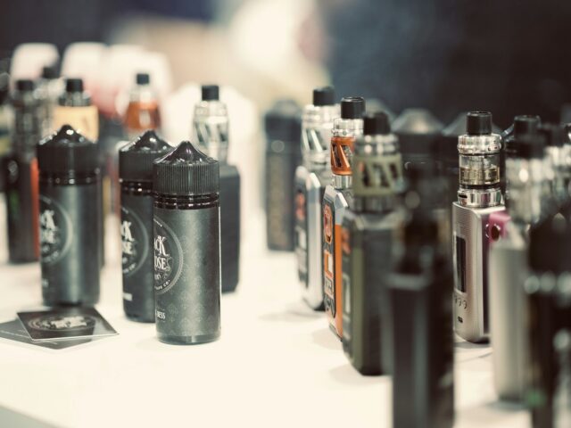 Table covered with assorted vaping devices