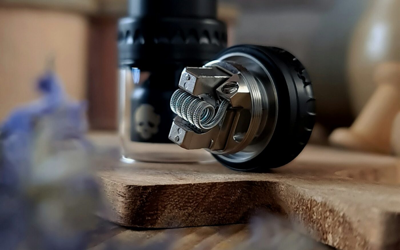 Tank and atomizer parts on a wooden table