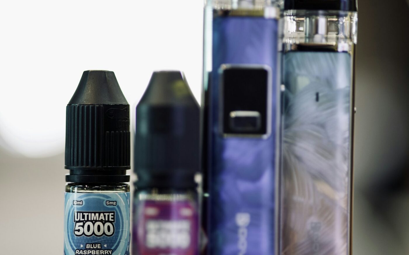 Two e-liquid bottles side by side