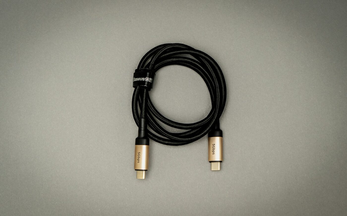Black charging cable on a table