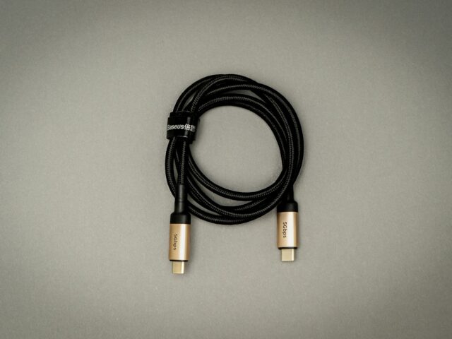 Black charging cable on a table
