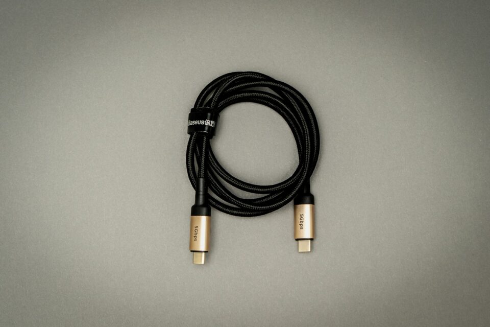 Black charging cable on a table